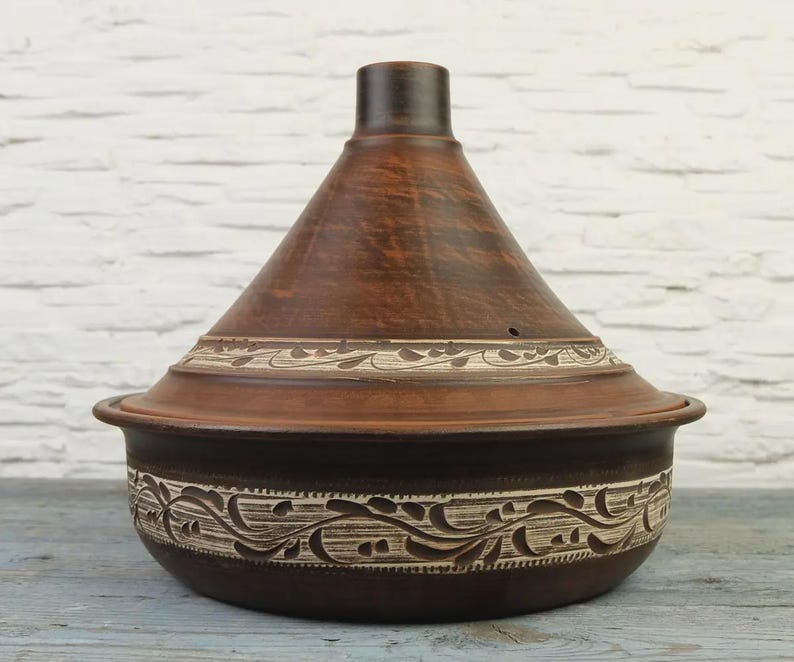 Unglazed terracotta Moroccan tagine with conical lid