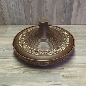 Deep ceramic casserole for stews and slow baking
