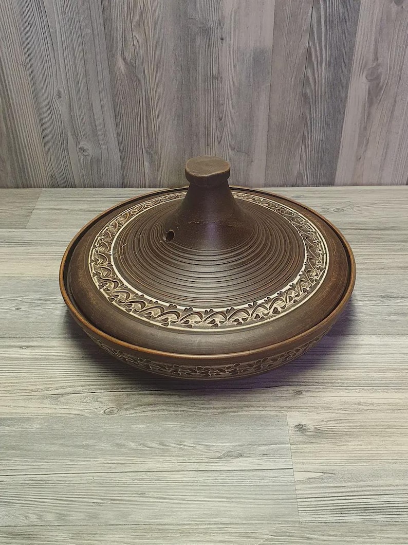 Deep ceramic casserole for stews and slow baking