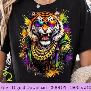 May include: Black t-shirt featuring a vibrant illustration of a tiger wearing sunglasses and a gold chain. The tiger is set against a colorful, abstract background with paint splatters. The text "PNG File - Digital Download - 300DPI- 4500 x 5400 PX" is at the bottom.
