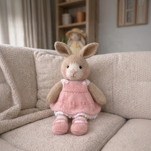 May include: A white ceramic mug with a black handle and the text "But First, Coffee" in a bold, black font. The mug is set against a neutral background, highlighting its simple design.