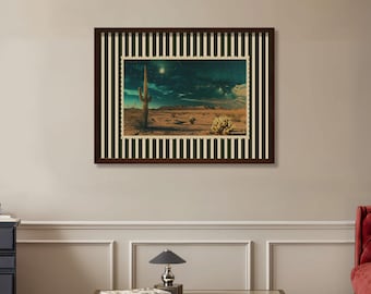 May include: A framed print featuring a desert landscape with a saguaro cactus under a starry night sky. The print has a postage stamp-like border and is set within a dark brown frame with a green and white striped border.