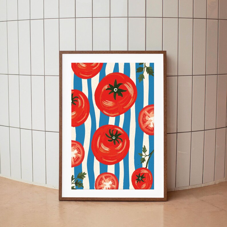 May include: A framed print with a blue and white striped background featuring red tomatoes. The tomatoes are arranged in a pattern and some are sliced in half.