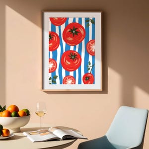 May include: A framed print of a blue and white striped background with red tomatoes. The tomatoes are arranged in a pattern and have a painted look.