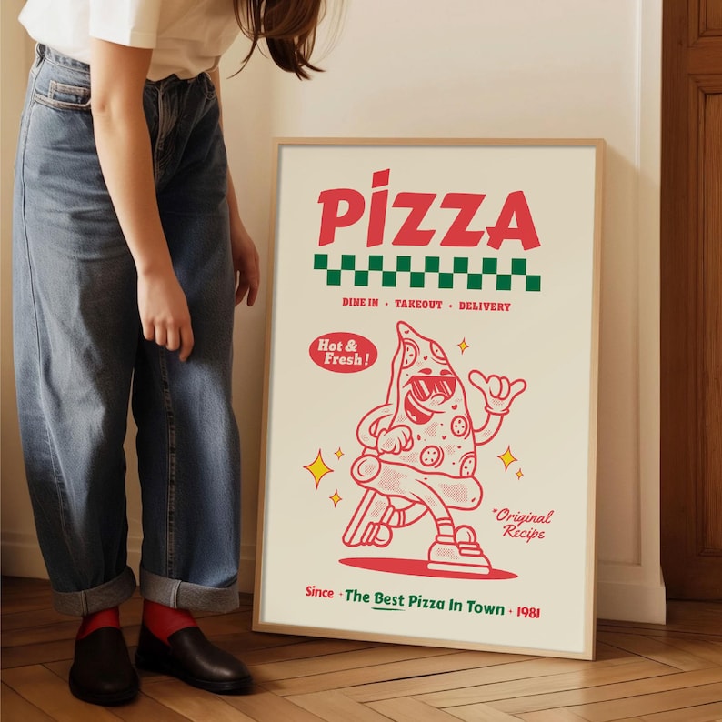 May include: A framed poster with a retro pizza design. The word "PIZZA" is in red, above a green and white checkered pattern. A cartoon pizza slice with sunglasses is giving a thumbs up. Text includes "Dine In, Takeout, Delivery", "Hot & Fresh!", and "Since The Best Pizza In Town 1981".