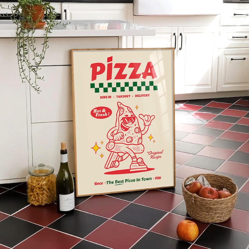 May include: A framed poster with the word "PIZZA" in red, a green and white checkered pattern, and a cartoon pizza slice character. The poster includes the text "Hot & Fresh!" and "Since The Best Pizza In Town - 1981".