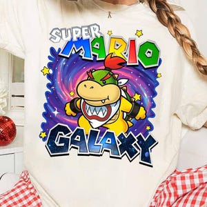 Super Mario Galaxy Movie Poster Name Shirt, Universal Studios Super Mario Tee, Mario 2026 Tee, Universal Orlando Gift, Epic Universe image 1
