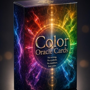 May include: A rectangular deck box for Color Oracle Cards featuring a vibrant rainbow spectrum background with glowing geometric crystal shapes. The front displays the text Color Oracle Cards, followed by No writing. No symbols. No numbers. Just colour.