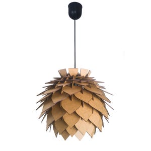 May include: A pendant light fixture with a unique design. The light features a series of layered, leaf-shaped wooden pieces, creating a textured, globe-like shade. The fixture is suspended from a black cord and a black ceiling mount.