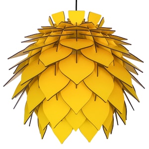 May include: A modern, yellow pendant light fixture with a layered, leaf-like design. The light has a black cord and a series of overlapping, heart-shaped panels. The panels are yellow with dark brown edges.