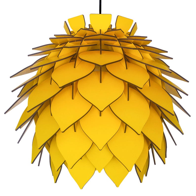 May include: A modern, yellow pendant light fixture with a layered, leaf-like design. The light has a black cord and a series of overlapping, heart-shaped panels. The panels are yellow with dark brown edges.
