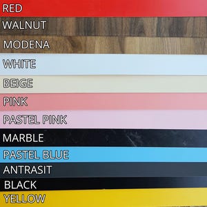 May include: A color palette featuring various hues and textures. The top row displays a vibrant red, followed by a walnut wood grain. Other colors include white, beige, pink, pastel pink, marble, pastel blue, anthracite, black, and yellow.