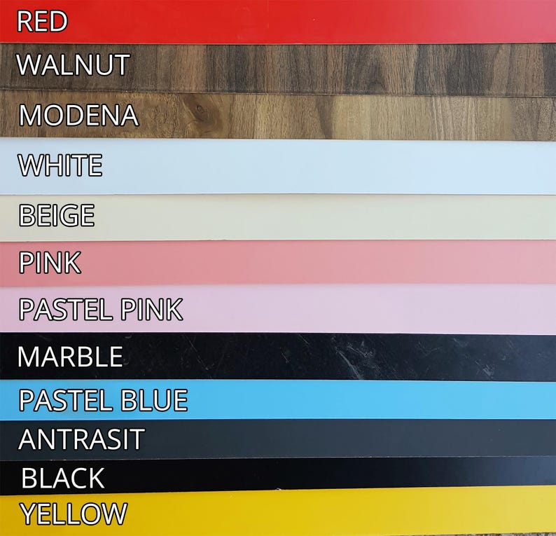 May include: A color palette featuring various hues and textures. The top row displays a vibrant red, followed by a walnut wood grain. Other colors include white, beige, pink, pastel pink, marble, pastel blue, anthracite, black, and yellow.