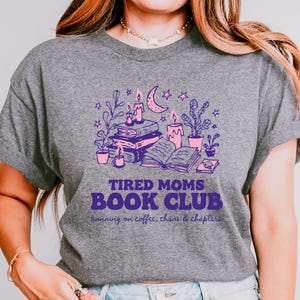 This Coffee Book Lover Mom PNG is perfect for moms who enjoy reading and relaxing with a good book. Great for shirts, stickers, mugs, and crafting.

A trendy Mom Book Club PNG featuring books, candles, and cozy reading vibes. Perfect for book lover shirts and sublimation projects.

This Funny Mom Reader PNG captures the chaos of motherhood and the joy of reading. Perfect for crafting and apparel designs.
