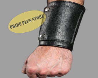 Polsini da polso/maniche/bracciali/portamonete da braccio da uomo in vera pelle al 100%.