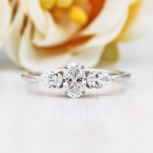 Oval Lab Grown Diamond Engagement Ring: Pear Side Stones, 14K Gold