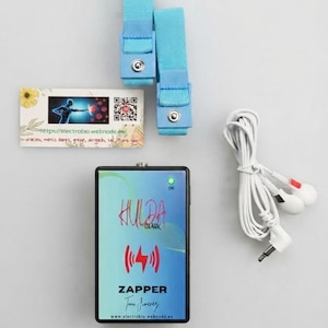 May include: A rectangular black electronic device labeled HULDA CLARK ZAPPER with a green indicator light, two light blue fabric wrist straps with metal snaps, a white coiled cable with two plugs, and a rectangular card with a QR code and text.