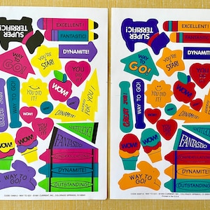May include: Two sheets of colorful stickers with encouraging messages like "Way to Go!" and "You Did It!"  The stickers are in various shapes, including stars, hearts, and lightning bolts.  The stickers are perfect for teachers, parents, or anyone who wants to give a little encouragement.
