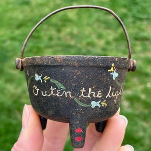 Vintage Miniature Cast Iron Bean Pot with Hand Painted Designs - “Outen the Light” Pennsylvania Dutch Decor - 2.5” Diameter