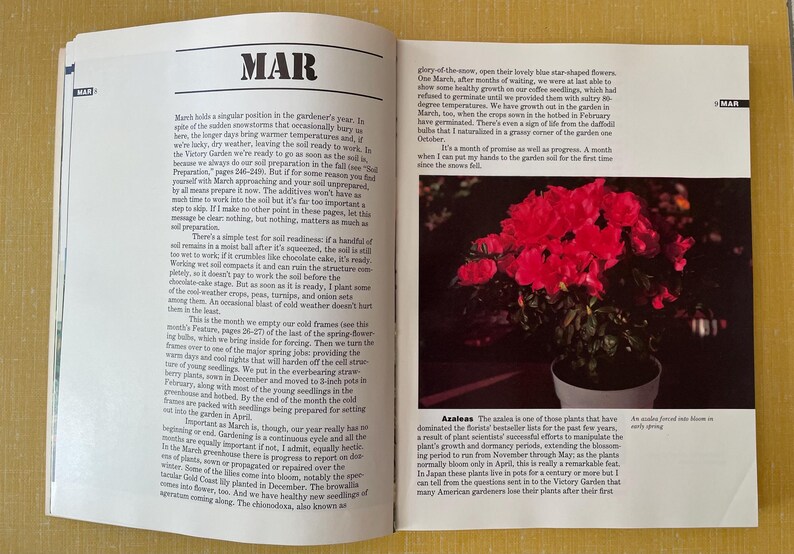 May include: An open book page titled MAR featuring black text on white paper and a photograph of a potted plant with vibrant pink flowers. The text discusses gardening tasks for March, while the image caption identifies the plant as Azaleas.