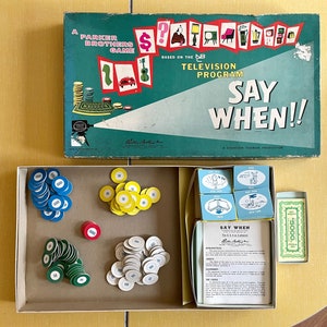 May include: A vintage board game called "Say When!" based on the television program. The game box is green and blue with a picture of a television screen. The game includes chips, cards, and a game board.