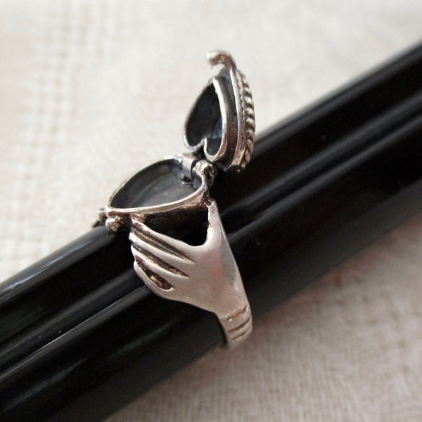 sterling poison heart ring - claddagh, secret compartment, heart in hands, heart opens, size 7