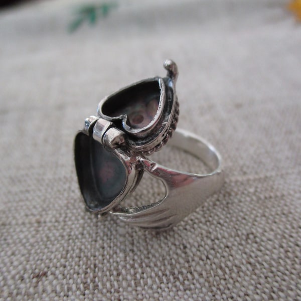 sterling poison heart ring - claddagh, secret compartment, heart in hands, heart opens, size 9