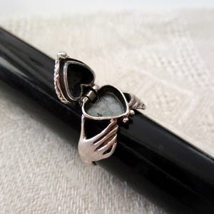 sterling poison heart ring - claddagh, secret compartment, heart in hands, heart opens, size 7