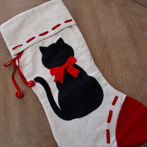 vintage cotton appliquéd CHRISTMAS STOCKING with a black cat, bells, red bow