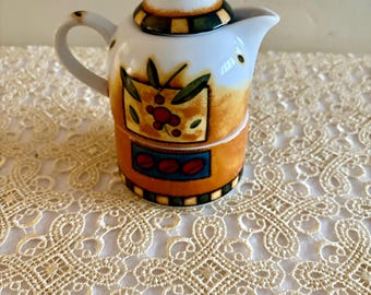 Juego apilable de lechera y azúcar. Cerámica francesa de mediados de siglo.