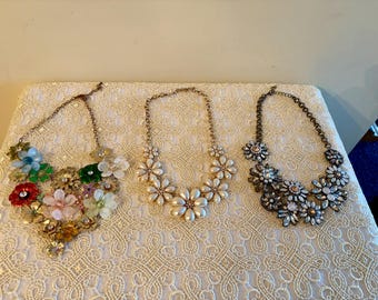 Lot of Three Floral Statement Bib Style Necklaces.