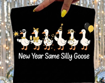 May include: Black pillowcase featuring a line of cartoon geese dressed for a New Year's celebration. The geese are wearing sunglasses, party hats, and holding champagne glasses and balloons. The text "New Year Same Silly Goose" is printed below the geese.