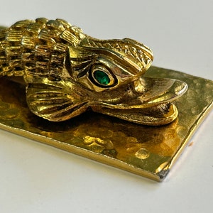 vintage fish pendant - gold tone fish on plaque with green rhinestone eyes - as is bail