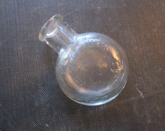 vintage pill bottle - Restieaux's Pills - embossed glass bottle, small round bottle