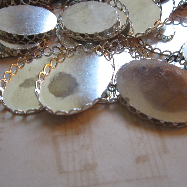 70 findings - bezel cups, stampings, silvertone - 8mm x 10mm to 23mm x 30mm