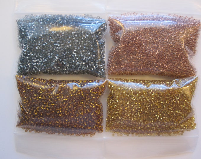 Glass Seed Bead Assortment 4 Baggies Silver and Copper Lined Rocaille