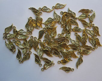 72 wing charms - antiqued gold finish - 16mm