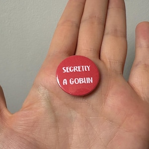 Secretly a goblin: pin back button badge.