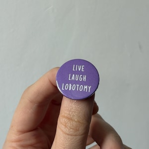 Live laugh lobotomy: pin back button badge.