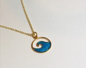 Catch the Wave in gold, gold wave, resin wave, blue wave, wave necklace
