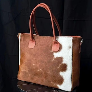 Rindsleder Tragetasche: Handgefertigte Fell Handtasche