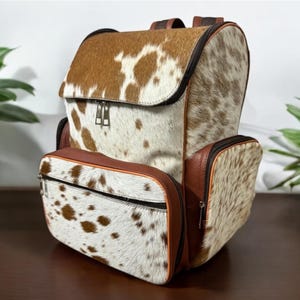Echte Rindsleder-Windel-Rucksack-Tasche - echte Rindsleder-Haare auf Western-Rucksack, haltbare Leder-Windel-Tasche, stilvolle Baby-Tasche.