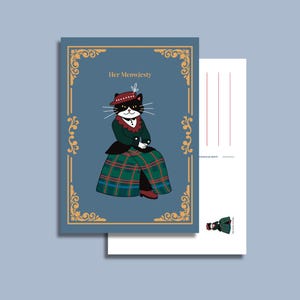 La sua cartolina Meowjesty raffigura un elegante gatto in abito scozzese, un regalo divertente perfetto per gli amanti dei gatti, fan della famiglia reale o amanti della cultura scozzese.