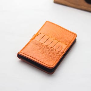 Porte-cartes à deux volets fait main haut de gamme en peau de patte d'autruche / Artemus - orange mandarine