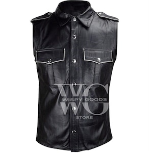 May include: Black leather sleeveless shirt with a button-down front, white stitching, and two large flap pockets. The shirt has a collar and is made of genuine leather.