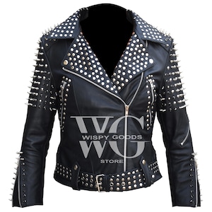 May include: Black leather jacket with silver studs and spikes. The jacket has a zipper closure and a belt with silver studs. The jacket is labeled "Wispy Goods Store".