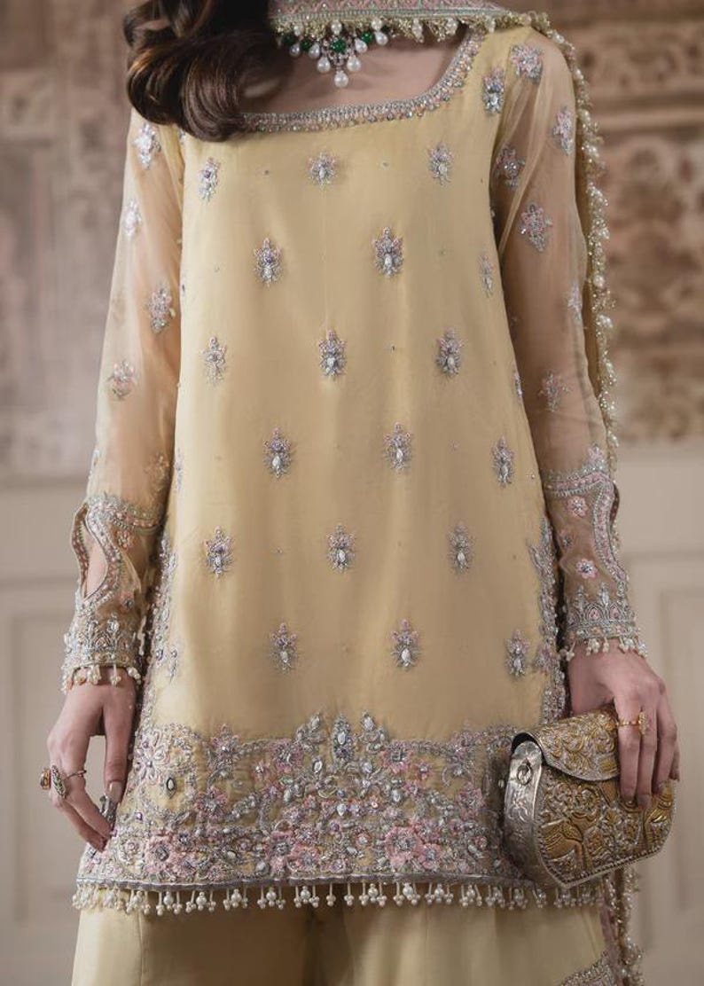 Pakistani suits, Pakistani wedding dresses, bridal dress Pakistani, Pakistani gown dresses, Pakistani salwar kameez, bridal gown Pakistani, Pakistani women's, Pakistani clothes, Pakistani bridal dresses, Pakistani designer, Pakistani wedding, Indian clothing, Indian wedding wear, embroidered maxi dress, Indian lehenga, Pakistani dresses for women, Indian dress, Indian wedding dress, Asian wedding dress, party wear Pakistani, mehndi outfit, desi bridal gown, Indian outfits, ethnic wear.