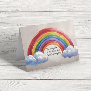 Brighten their day with this rainbow-filled card: “You bring color to my cloudy days. Happy Friendship Day!”