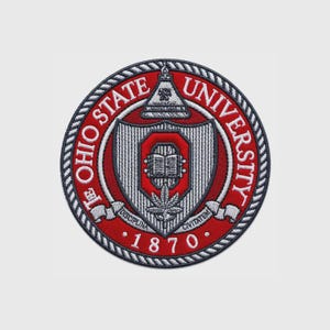 May include: A circular embroidered patch featuring the Ohio State University seal in red, white, and grey. The design includes a central shield with an open book, a leaf, and the text Ohio State University and 1870 with a rope-style border.