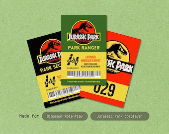May include: Three rectangular identification badges featuring the Jurassic Park logo. One black badge labelled Park Security, one green badge labelled Park Ranger, and one red badge with the number 029. Each includes InGen branding and barcodes.